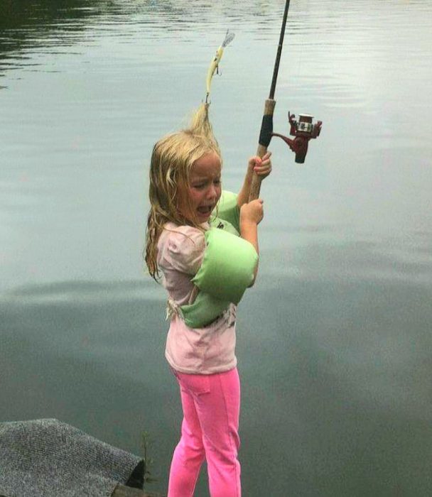 Hold on sweetie, Daddy’s looking for his scissors.