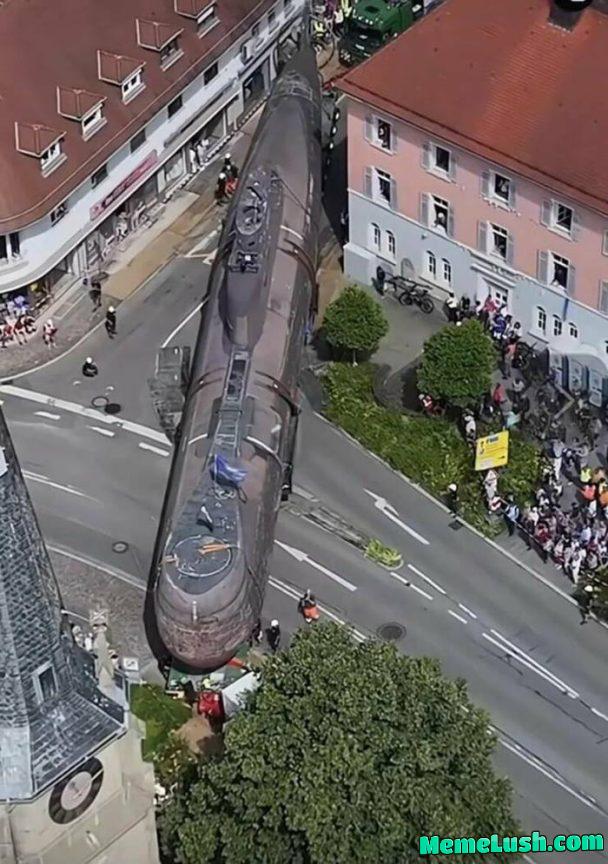 A German submarine U17 is transported through an inner city to a museum A German submarine U17 is transported through an inner city to a museum