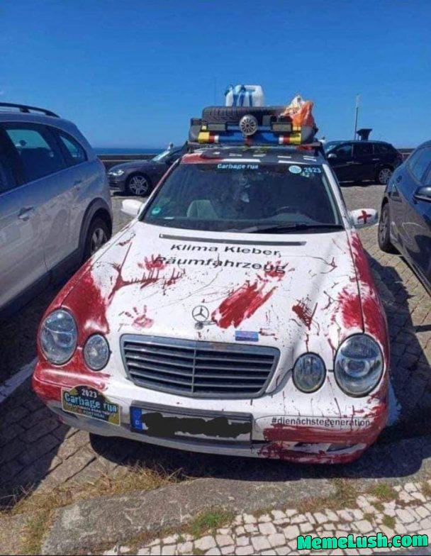 Clima protester cleaning car