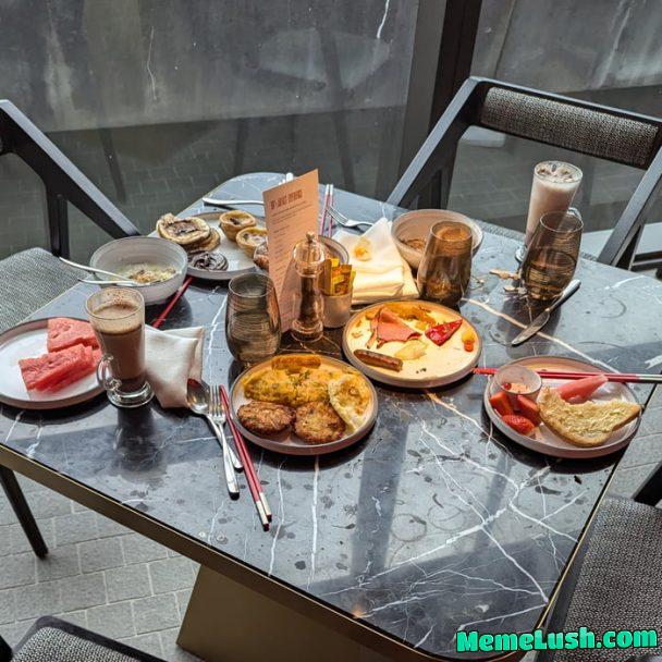 The amount of food left wasted at a table next to us at a buffet breakfast The amount of food left wasted at a table next to us at a buffet breakfast