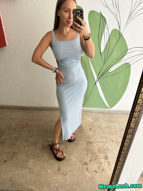 This tight blue dress is practically begging to be taken off :)