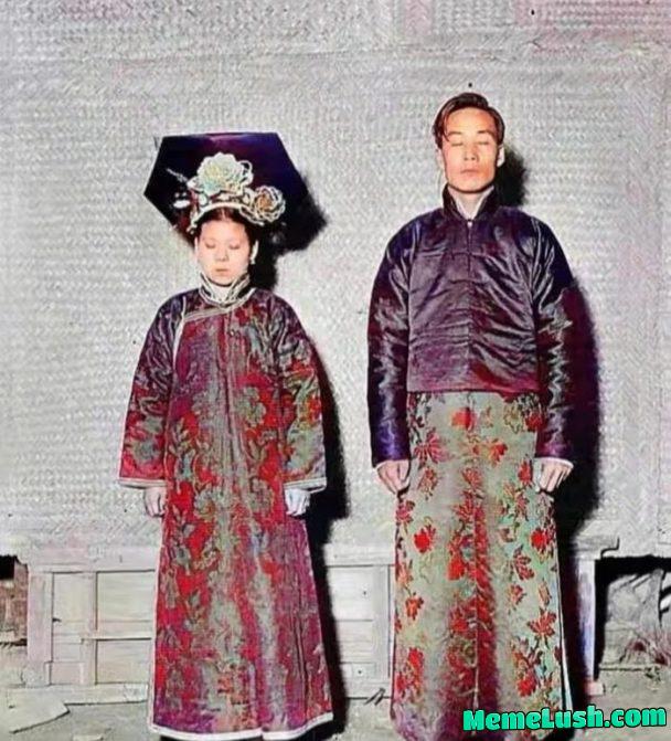 Taken in Ching Dynasty. A couple took this photo with their eyes shut