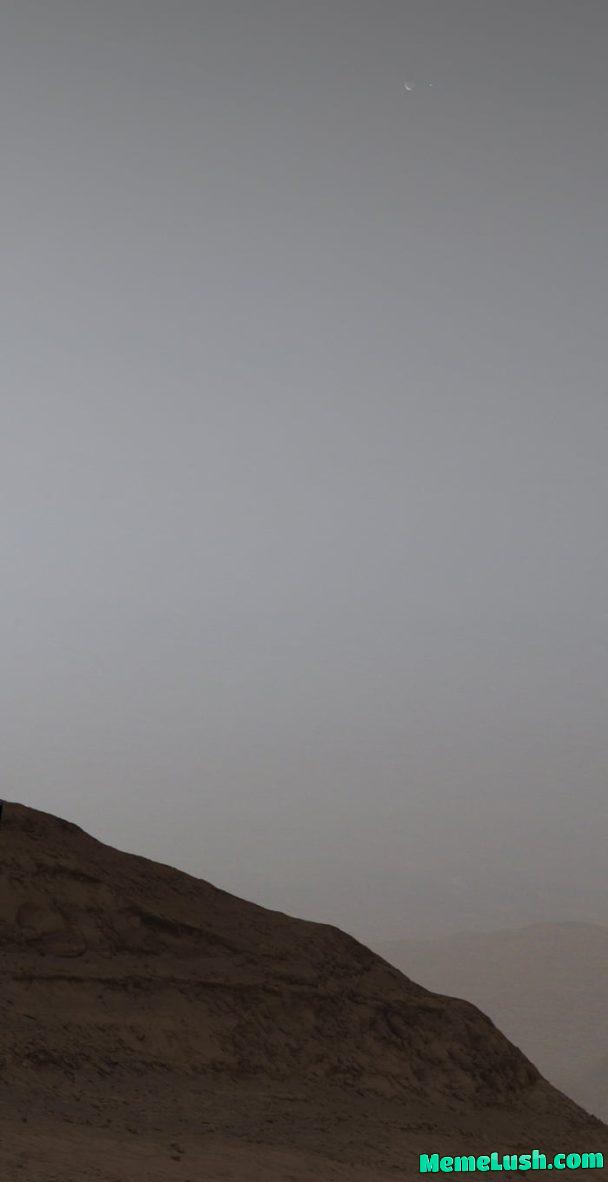 This photo was taken from Mars, if you zoom in on the top right you’ll see the moon Phobos, the bright spec next to it is Earth