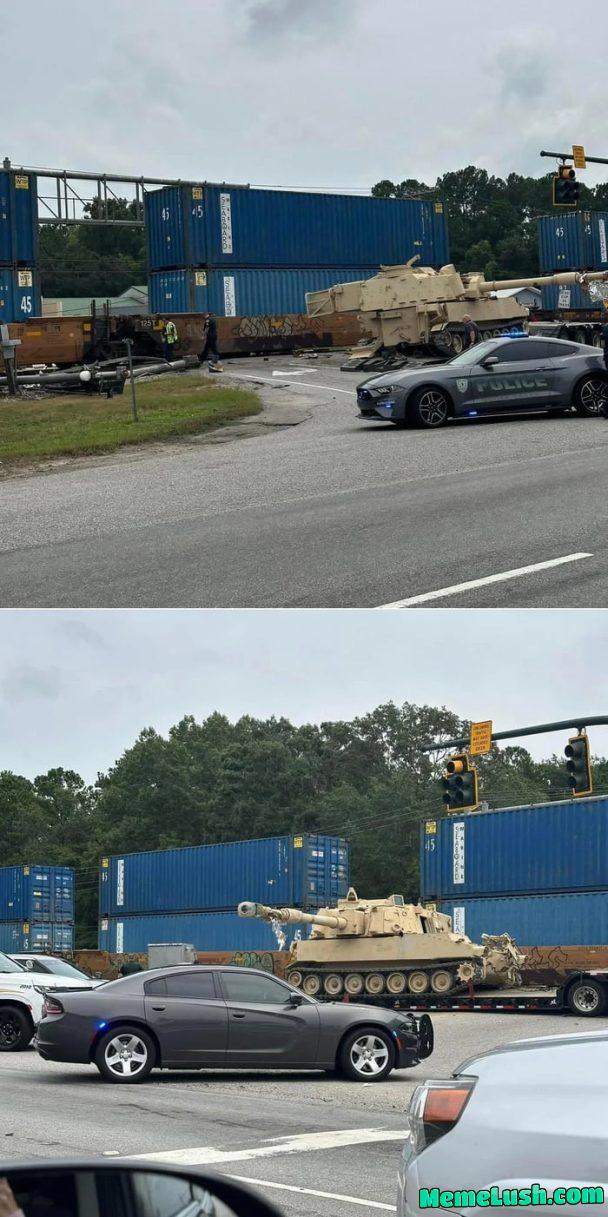 A truck carrying a M109 Paladin got hit by a train. Guess who won.